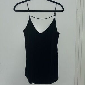 Black flowy camisole top with deep V back. Lightly worn and zero pulls